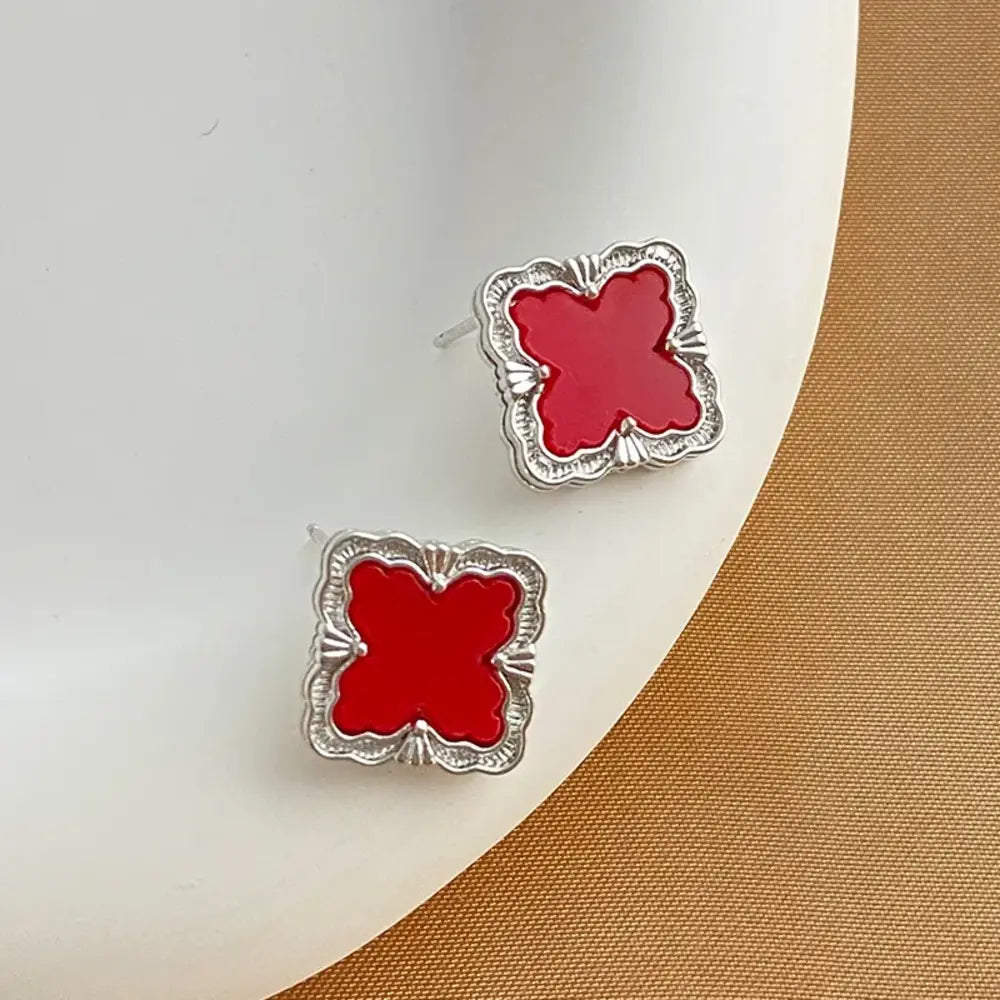 
  
  Quatrefoil Stud Earrings
  
