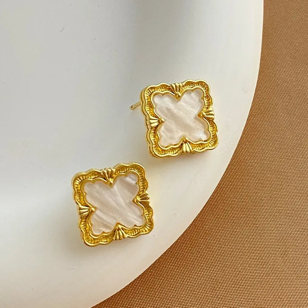 
  
  Quatrefoil Stud Earrings
  
