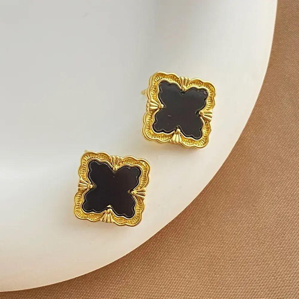 
  
  Quatrefoil Stud Earrings
  
