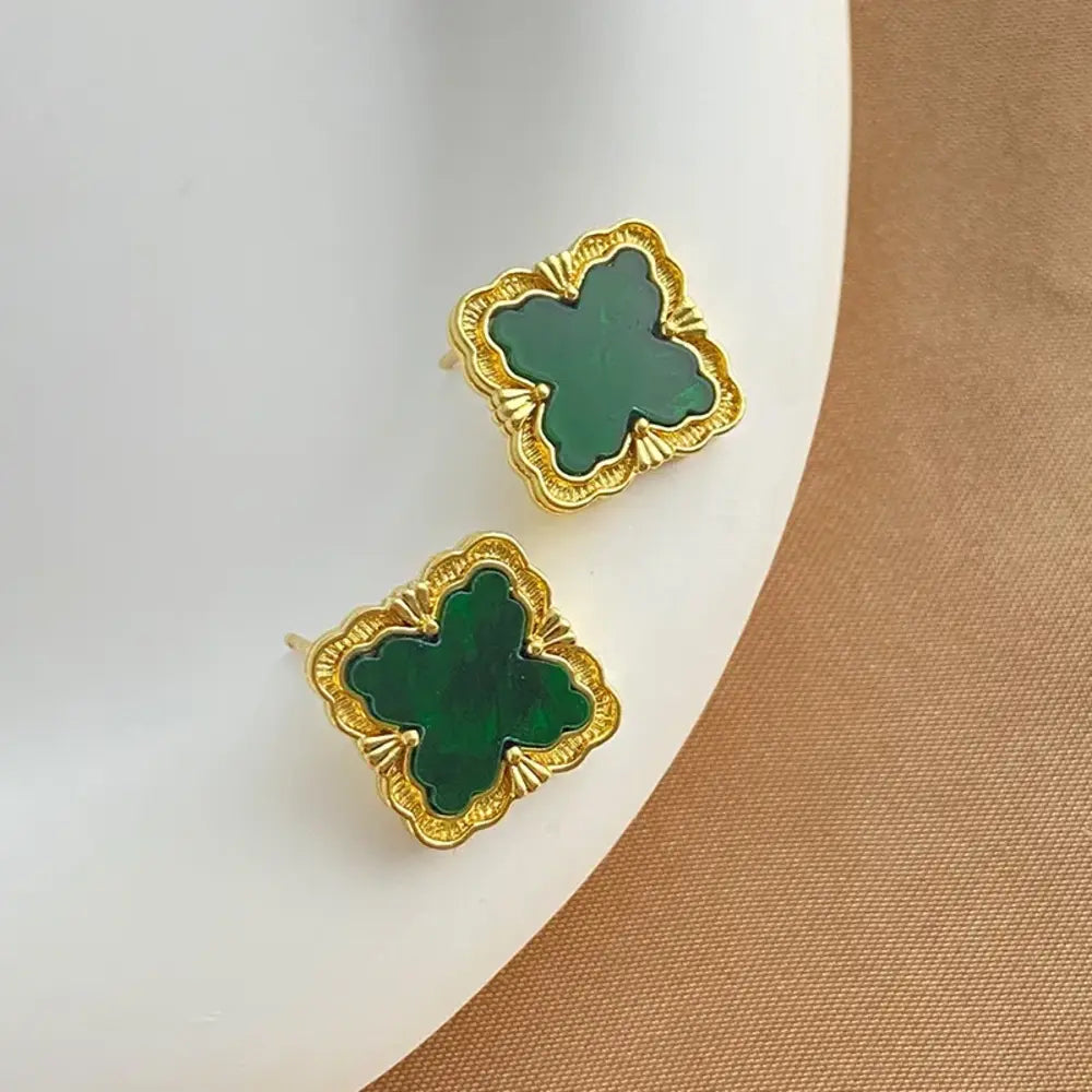 
  
  Quatrefoil Stud Earrings
  
