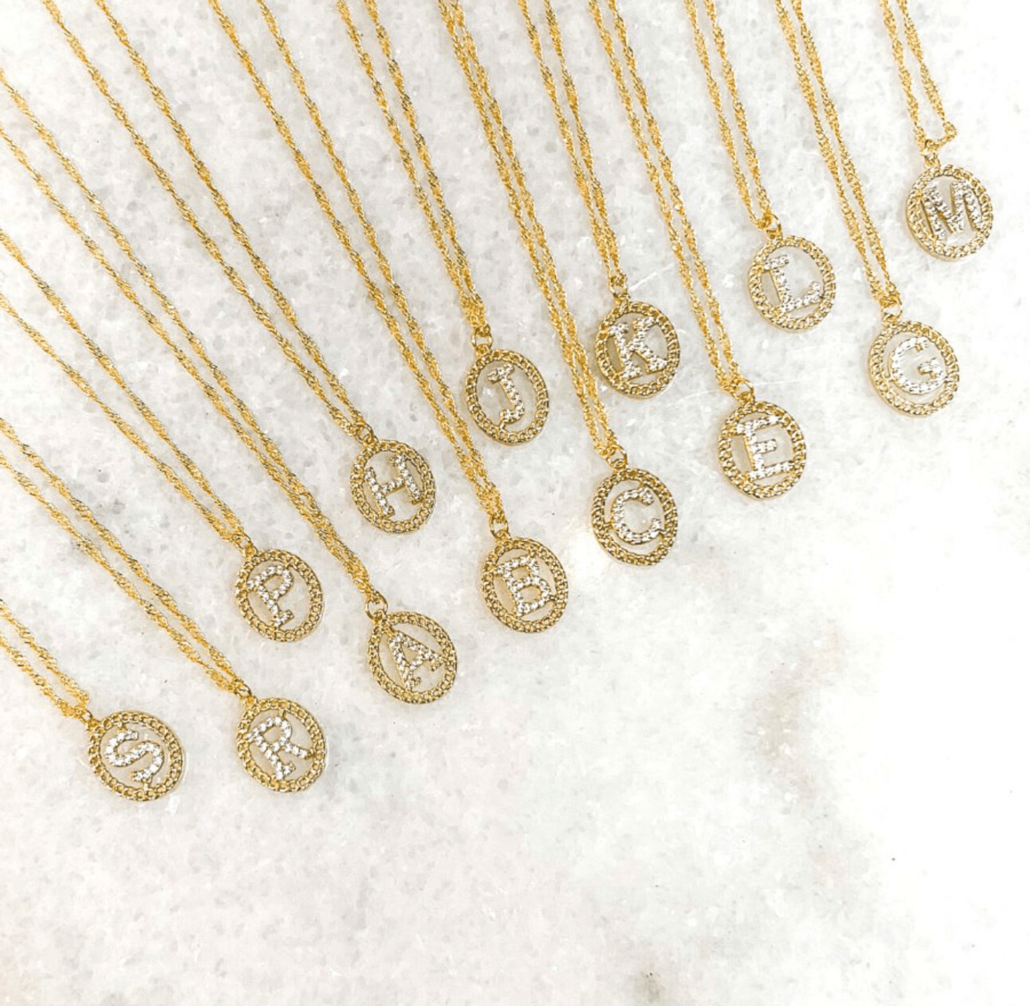 
  
  Initial Twist Necklaces
  
